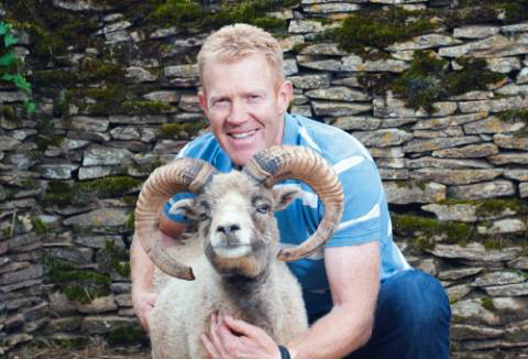 Adam Henson with a North Ronaldsay ram